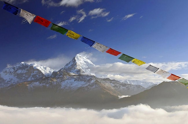 Mountain summit and prayer flags, Annapurna Circuit, Nepal